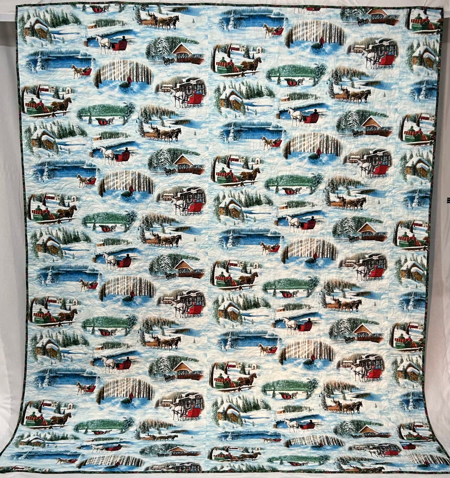 Whirligig Holiday Quilt with Pillow Sleeve (King)