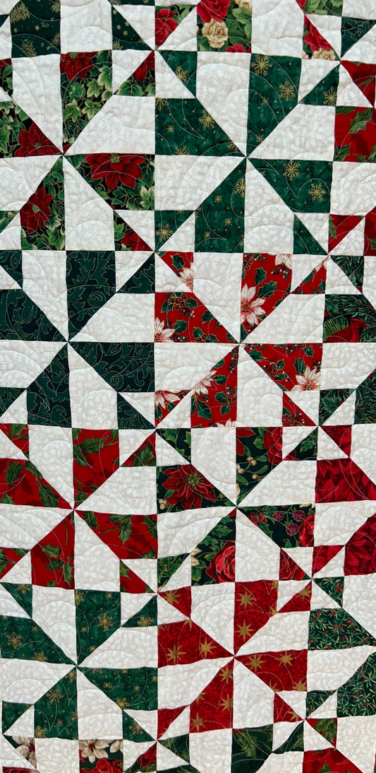 Whirligig Holiday Quilt with Pillow Sleeve (King)